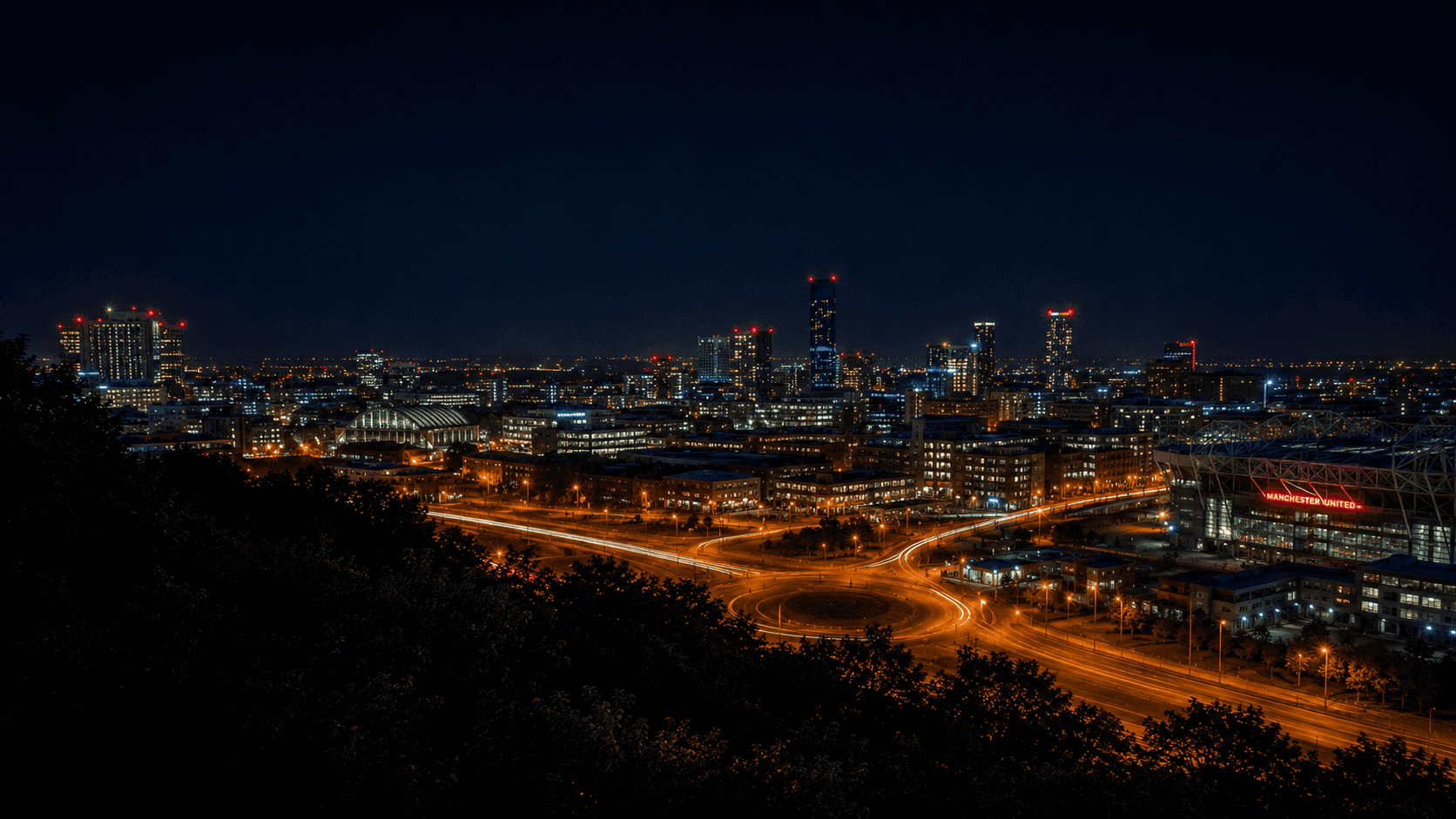 Manchester skyline at night — Empire outcall coverage area